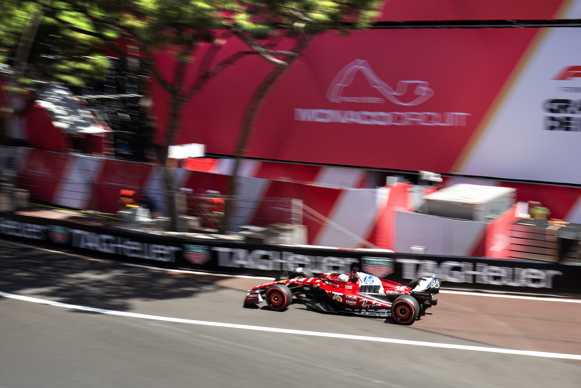 Ferrari Formula 1 car racing on the Monaco circuit during the Monaco Grand Prix.