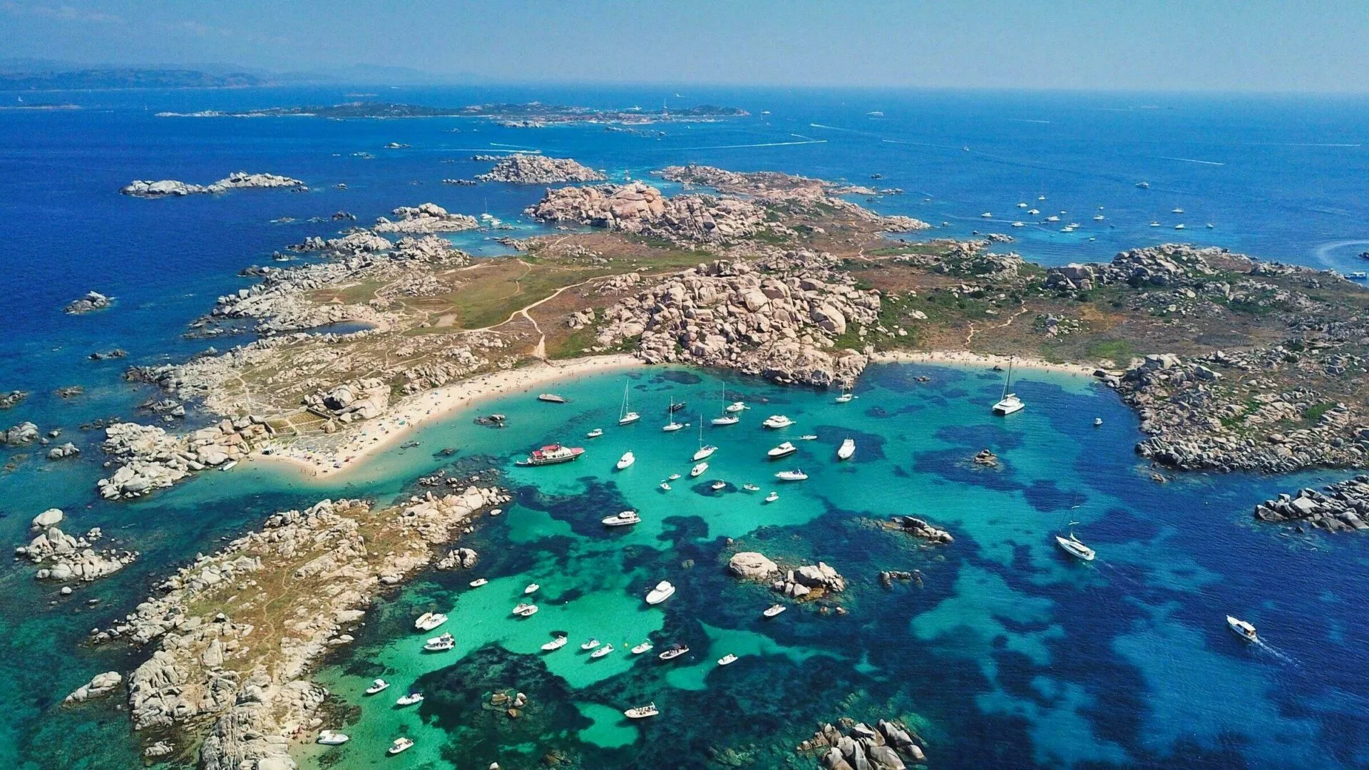 Scenic perspective of the Îles Lavezzi, featuring granite rock formations and pristine Mediterranean sea in southern Corsica.