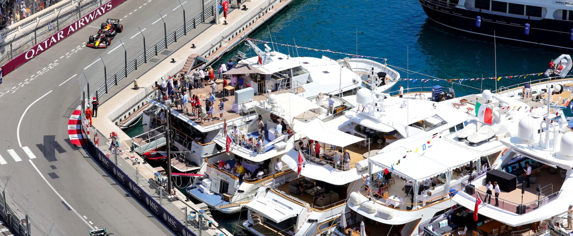 Monaco Formula One Grand Prix corner overlooking luxury yachts in Port Hercule – premium corporate hospitality and incentive events